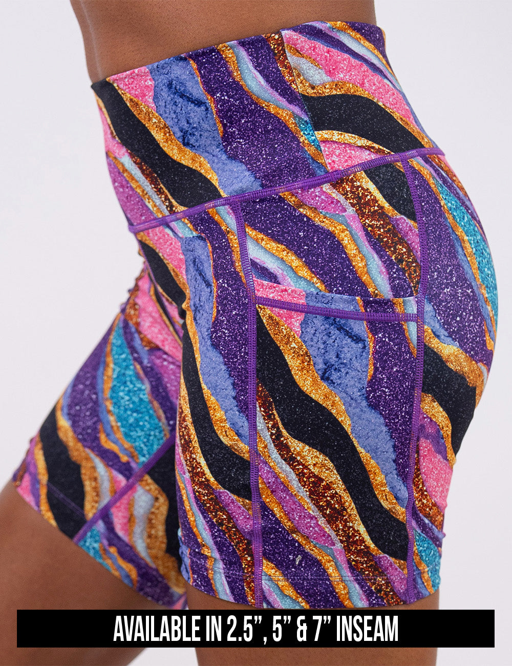 available inseam lengths for the purple, gold, black, blue, and pink abstract stripes shorts, lengths include 2.5, 5, and 7 inches