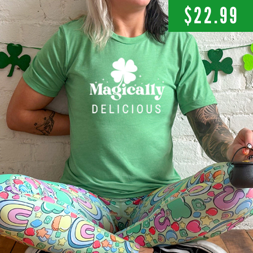 $22.99 green unisex shirt with a quote on it in white that says "magically delicious"