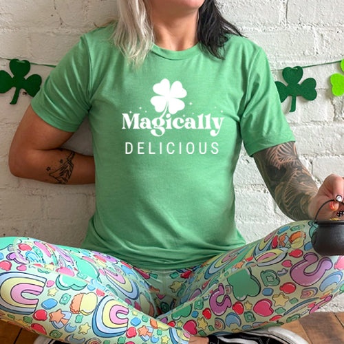 green unisex shirt with a quote on it in white that says "magically delicious"