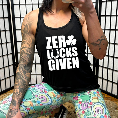 black racerback tank top with the quote "zero lucks given" in white