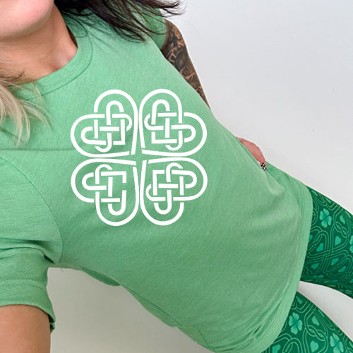 green unisex shirt with a celtic knot graphic in white