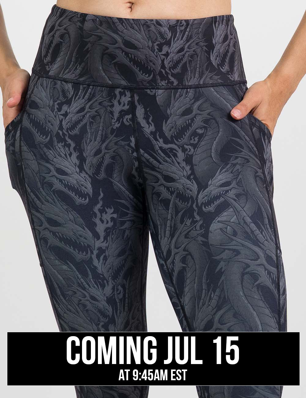 close up of the black leggings with grey dragons against a white background, coming july 15th