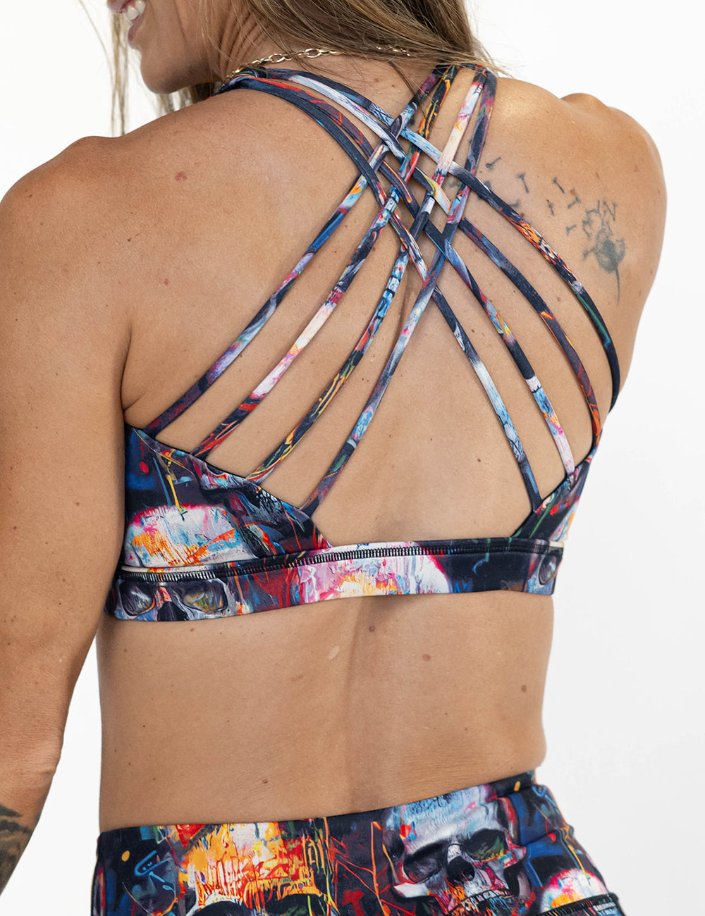back of skull paint splatter sports bra