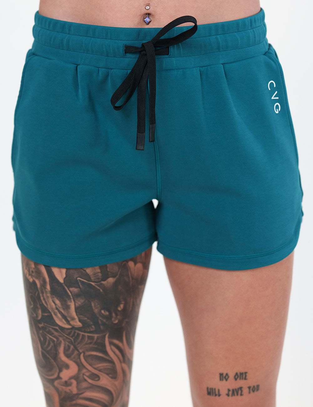 front of the teal shorts against a white background