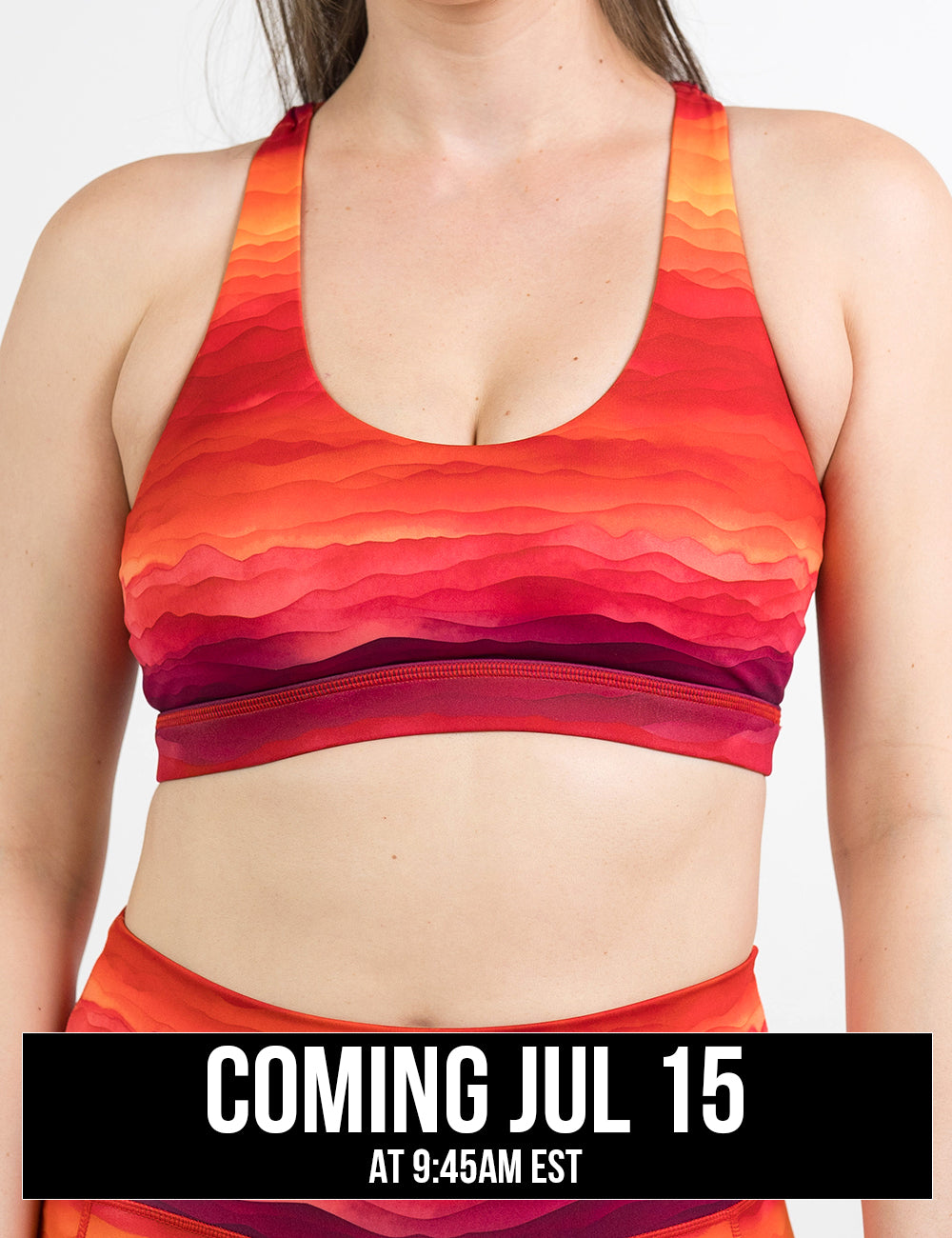 model wearing the red, yellow, and orange sunset stripes pattern butterfly back bra against a white background, coming july 15th
