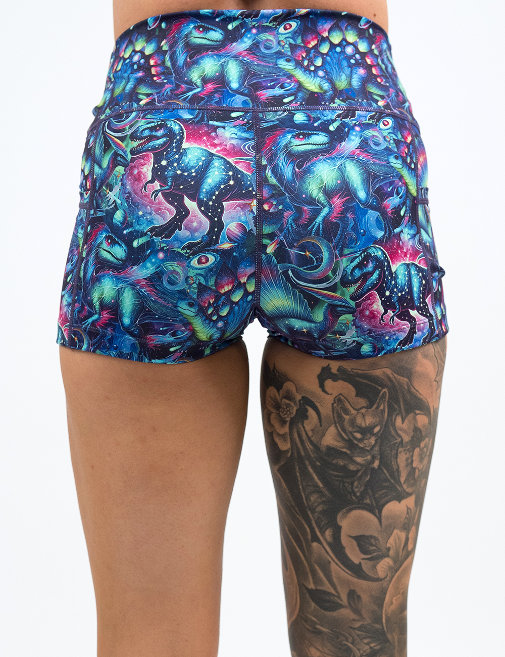 back of the 2.5 inch colorful dinosaur shorts against a white background