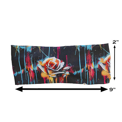 paint splatter rose headband measured at 2 by 9 inches