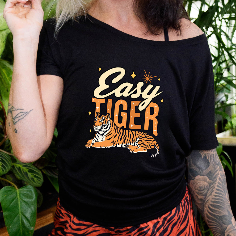 black slouchy tee with a graphic of a tiger and the text "easy tiger" on it
