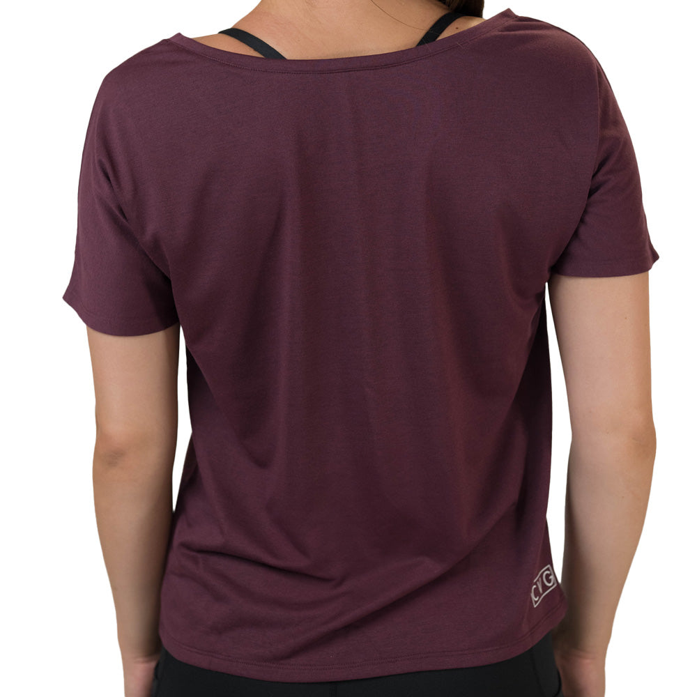 back of the maroon off-shoulder top worn by a person