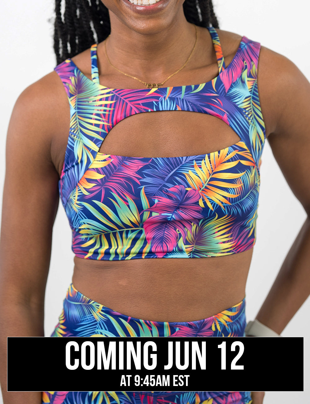 front of the vibrant tropical leaves vista bra against a white background, coming june 12th