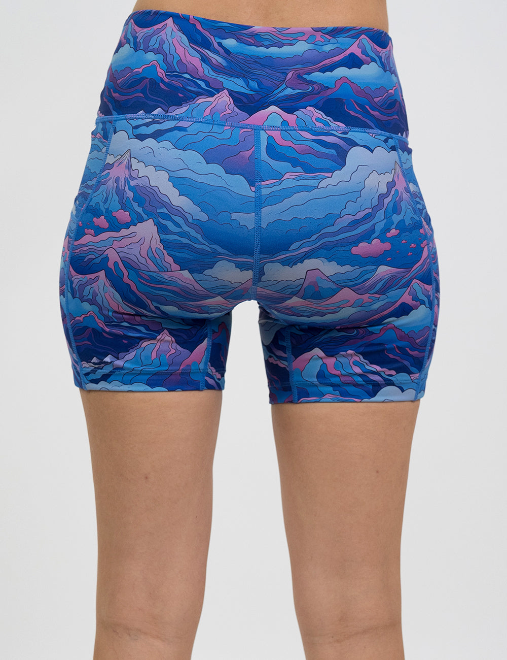 back of the 5 inch blue and pink mountains shorts against a white background