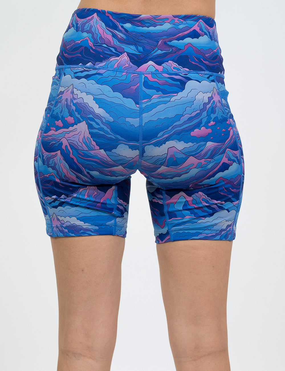 back of the 7 inch blue and pink mountains shorts against a white background