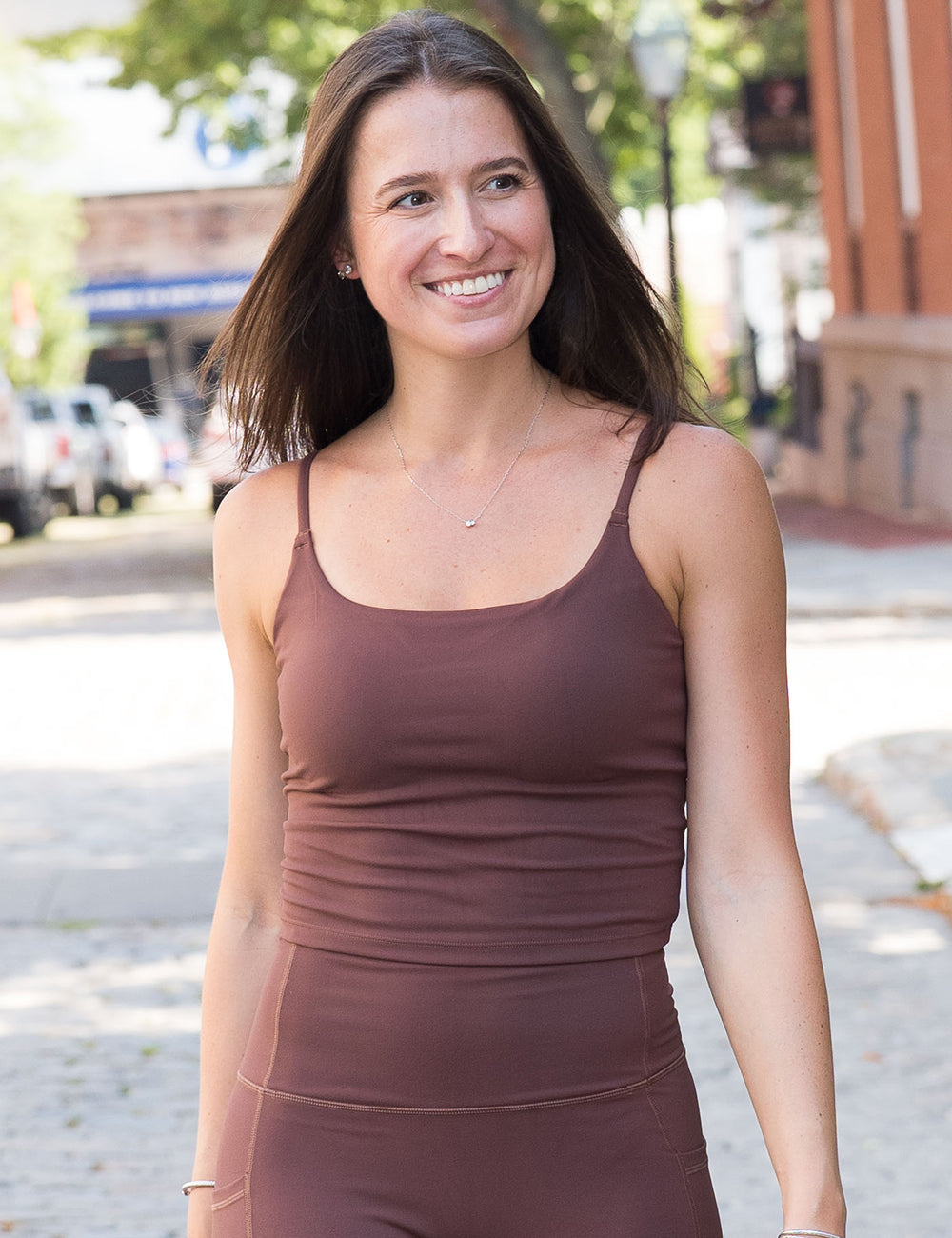 model wearing the light brown cami top and leggings