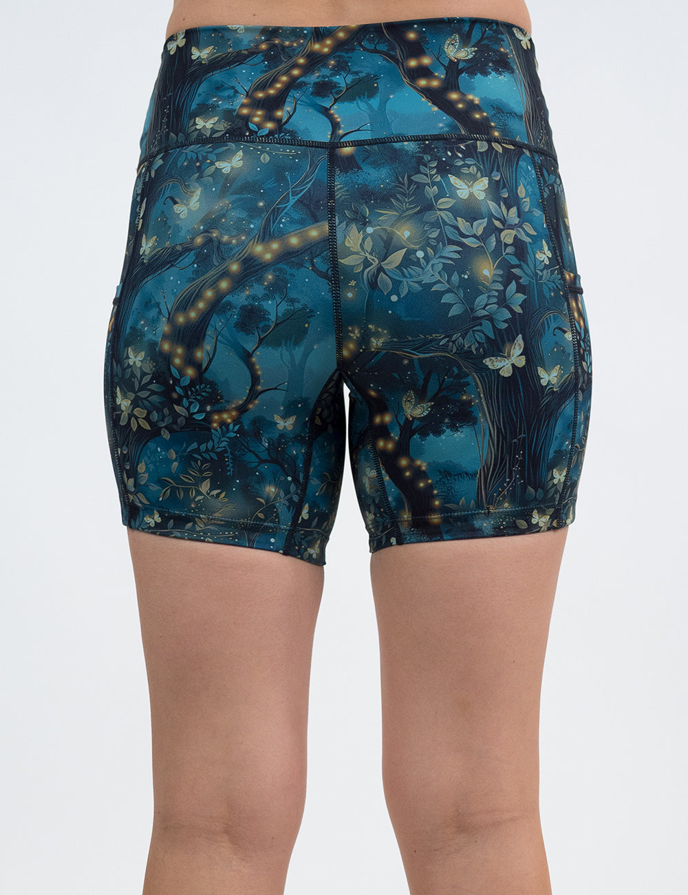 back of the 5 inch forest filled with firefly's pattern shorts against a white background