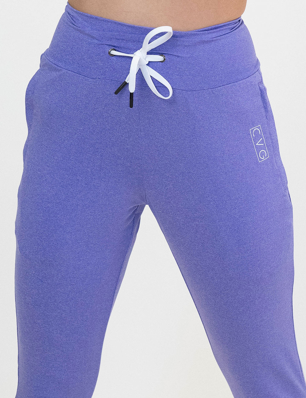 Purple joggers against a white background