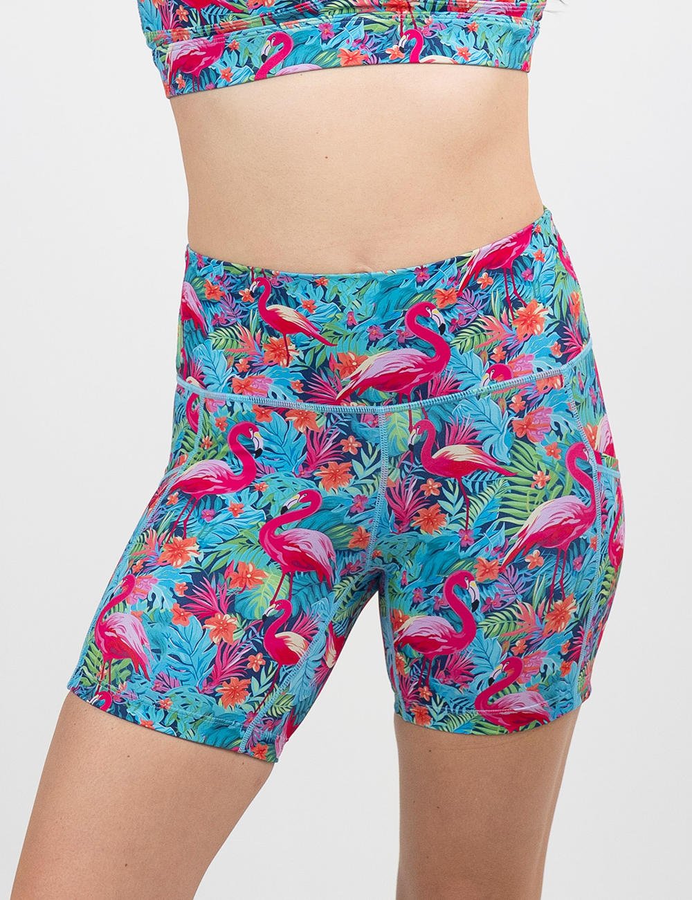 close up of the 5 inch colorful flamingos shorts against a white background