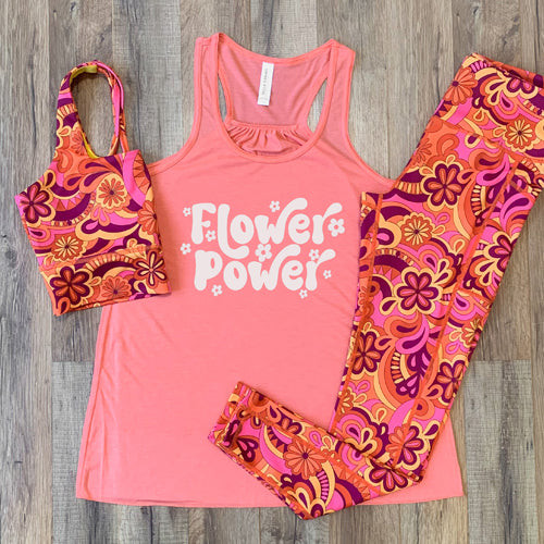coral flower power racerback shirt with 70s inspired leggings and sports bra