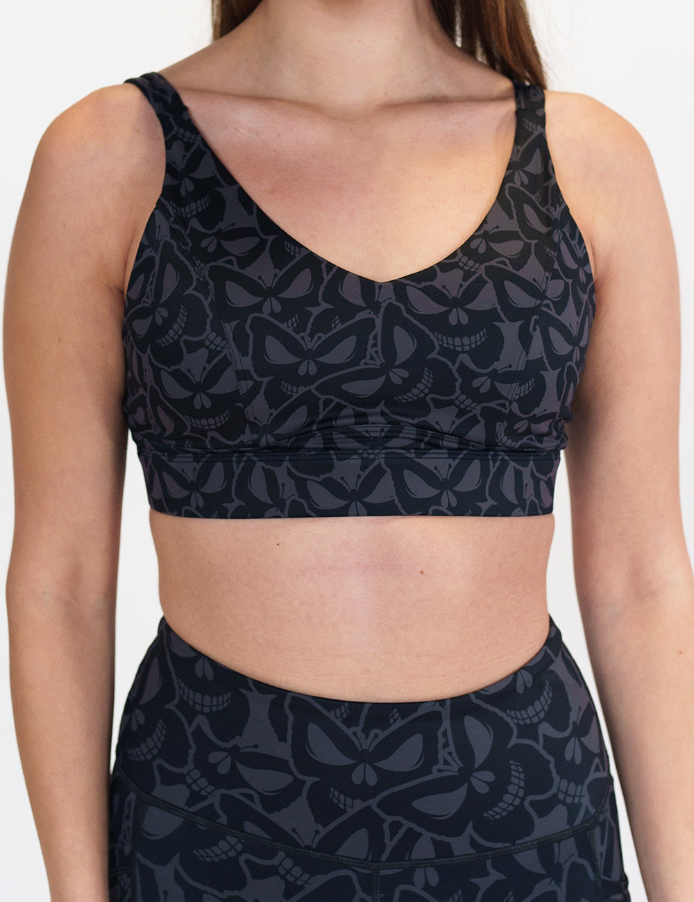 grey and black butterfly shaped skulls patterned bra