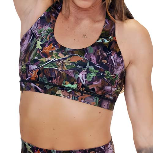front of the forest camo patterned sports bra
