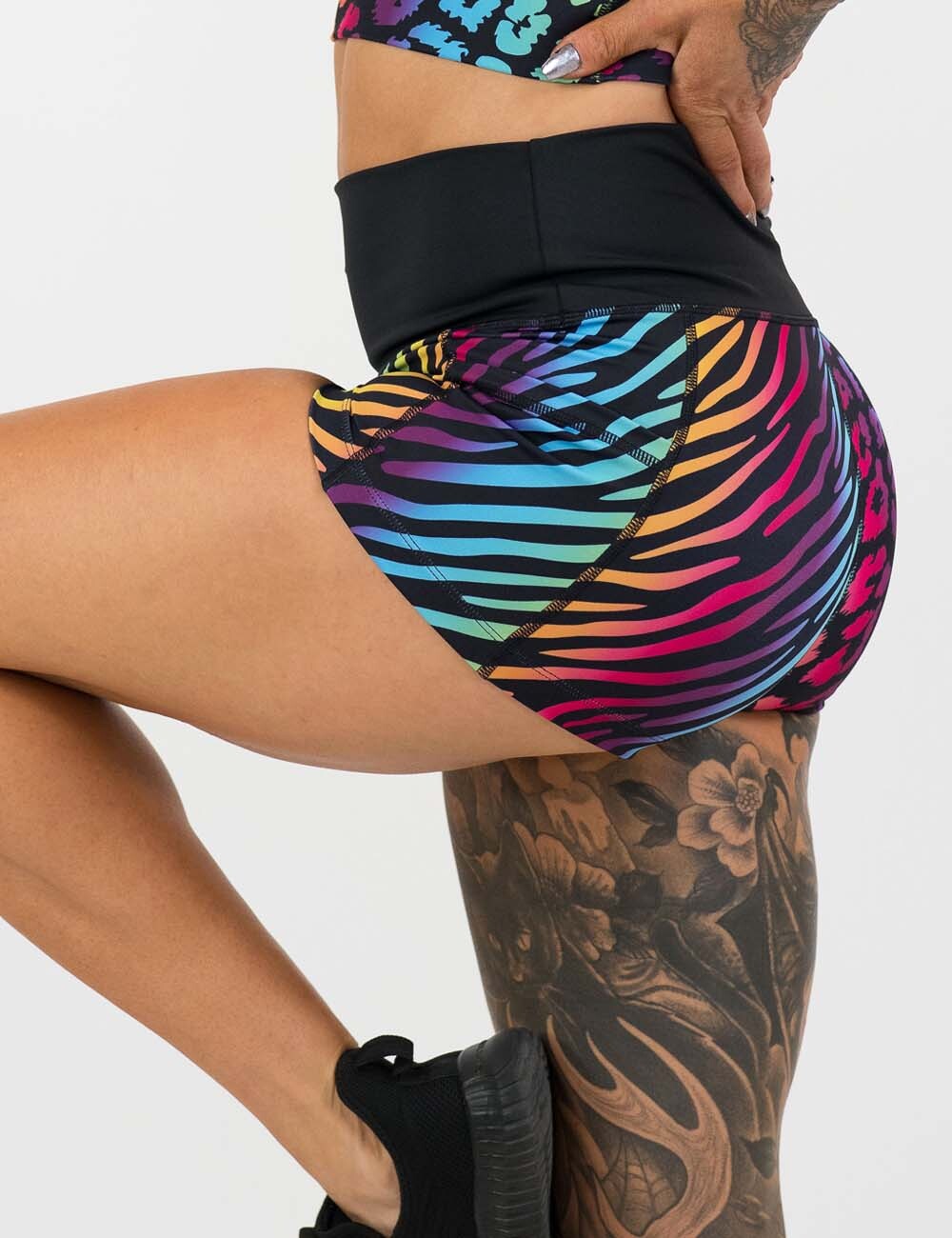 close up of the 2.5 inch zebra and leopard rainbow print shorts against a white background