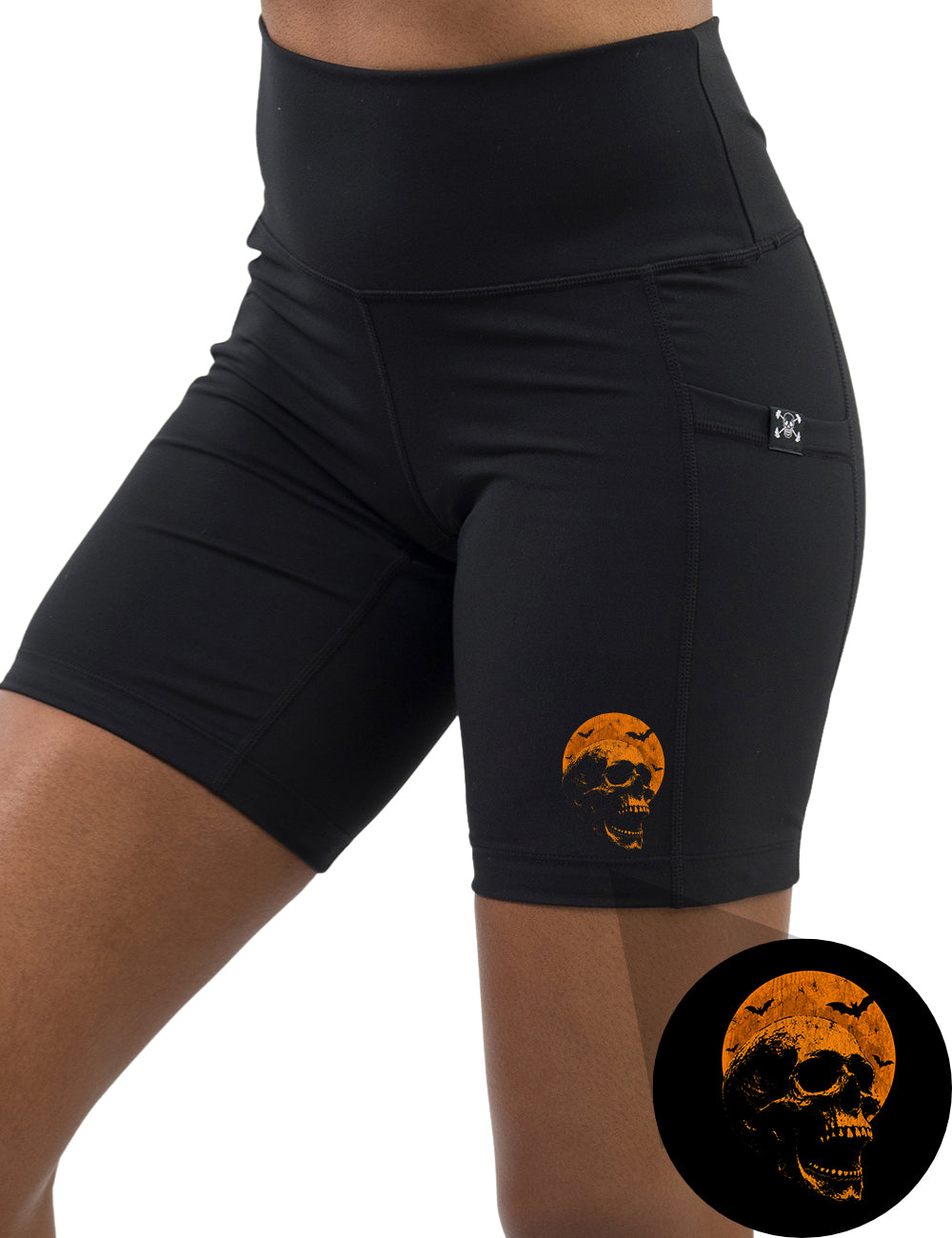 front of the orange skull in front of a orange moon graphic 7 inch shorts