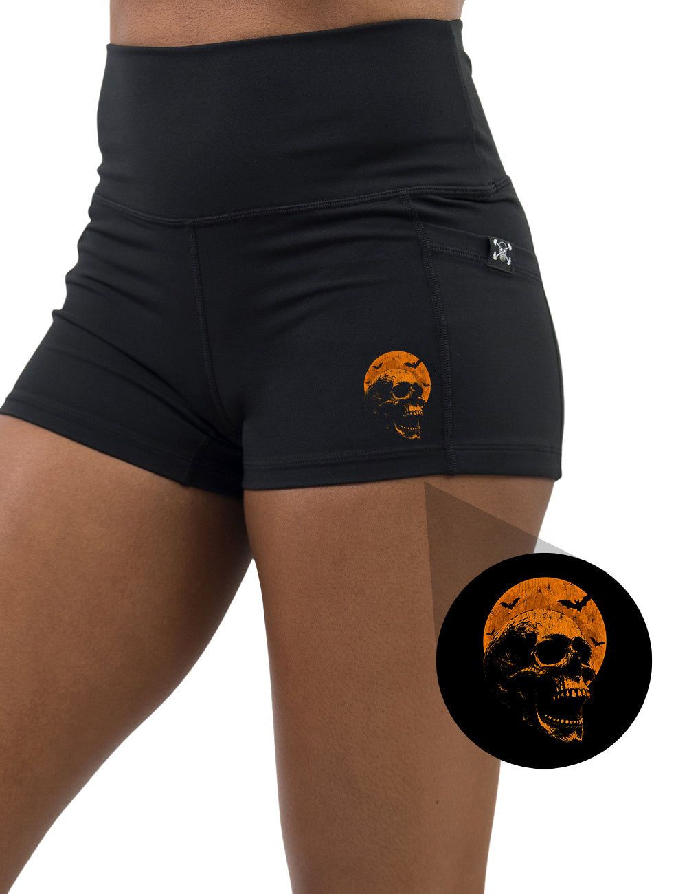 front of the orange skull in front of a orange moon graphic 2.5 inch shorts