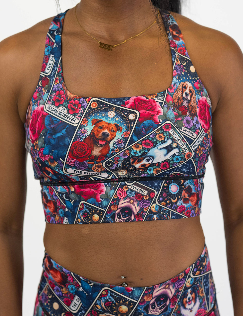front of the colorful sports bra with dog illustration pattern on it