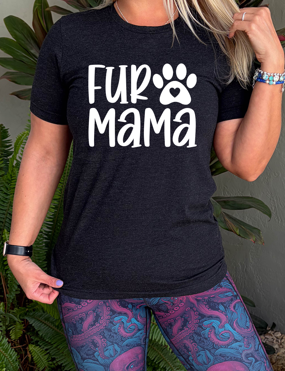 black unisex tee with the words "fur mama" on it and a pawprint graphic with a little heart at the center of it