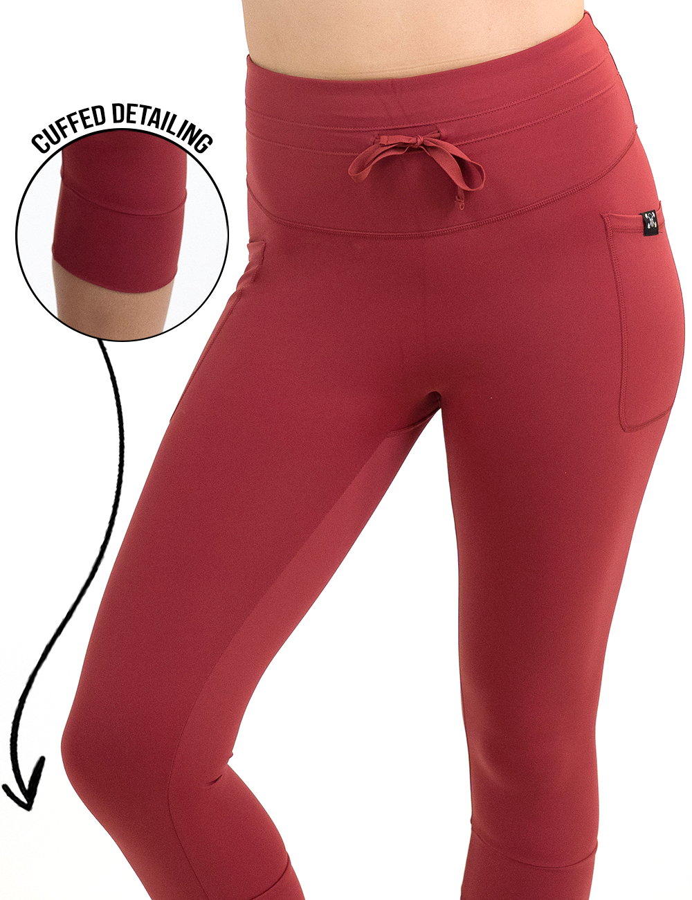 bold red omni drawstring leggings facing the front against a white background with a close up of the cuffed detailing