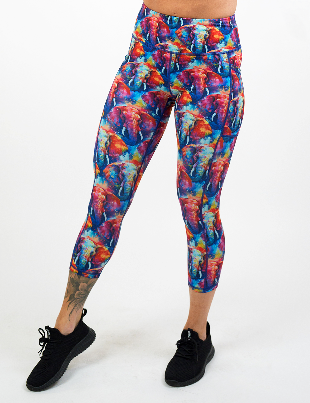 colorful elephant pattern capri leggings facing the front against a white background