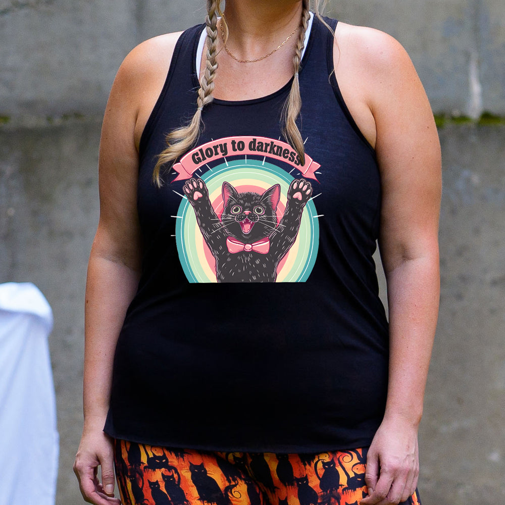 black shirt with the saying "Glory To Darkness" on it