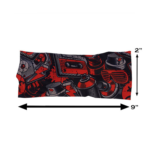graffiti patterned headband measured at 2 by 9 inches
