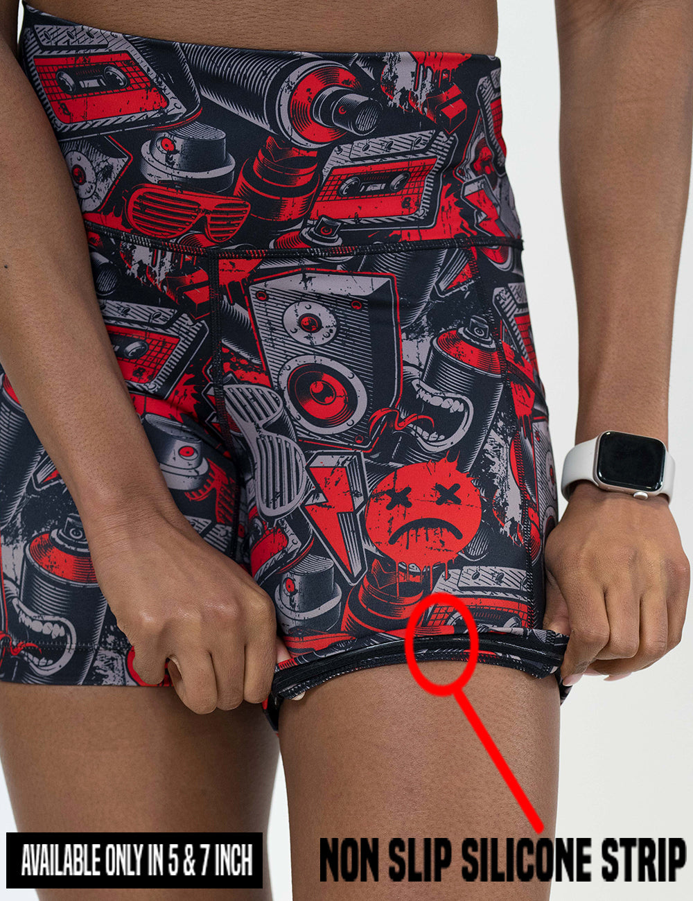 close up of the graffiti patterned shorts rolled up to show the non slip silicone strip found in the 5 and 7 inch shorts