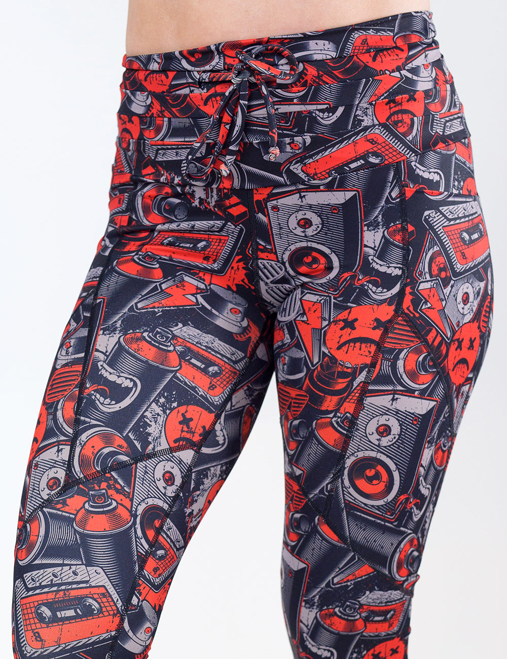 graffiti patterned leggings against a white background