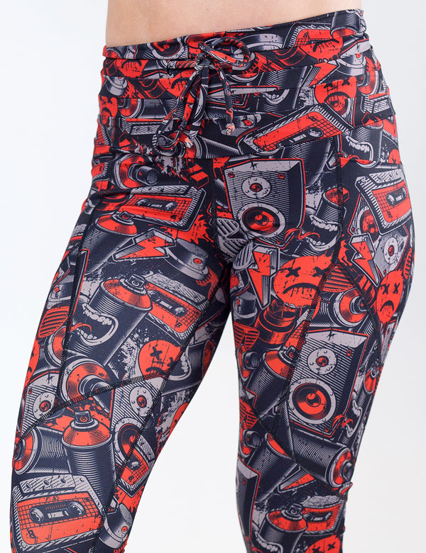 graffiti patterned leggings against a white background