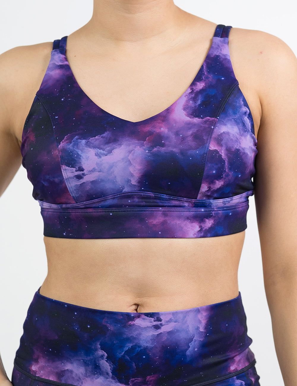 front of the purple space pattern vitality bra against a white background
