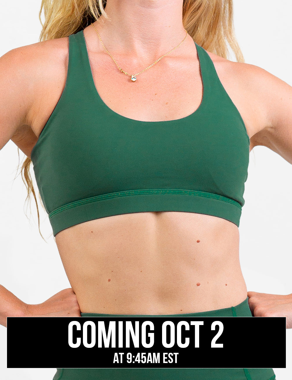 front of the solid green sports bra against a white background, coming October 2nd