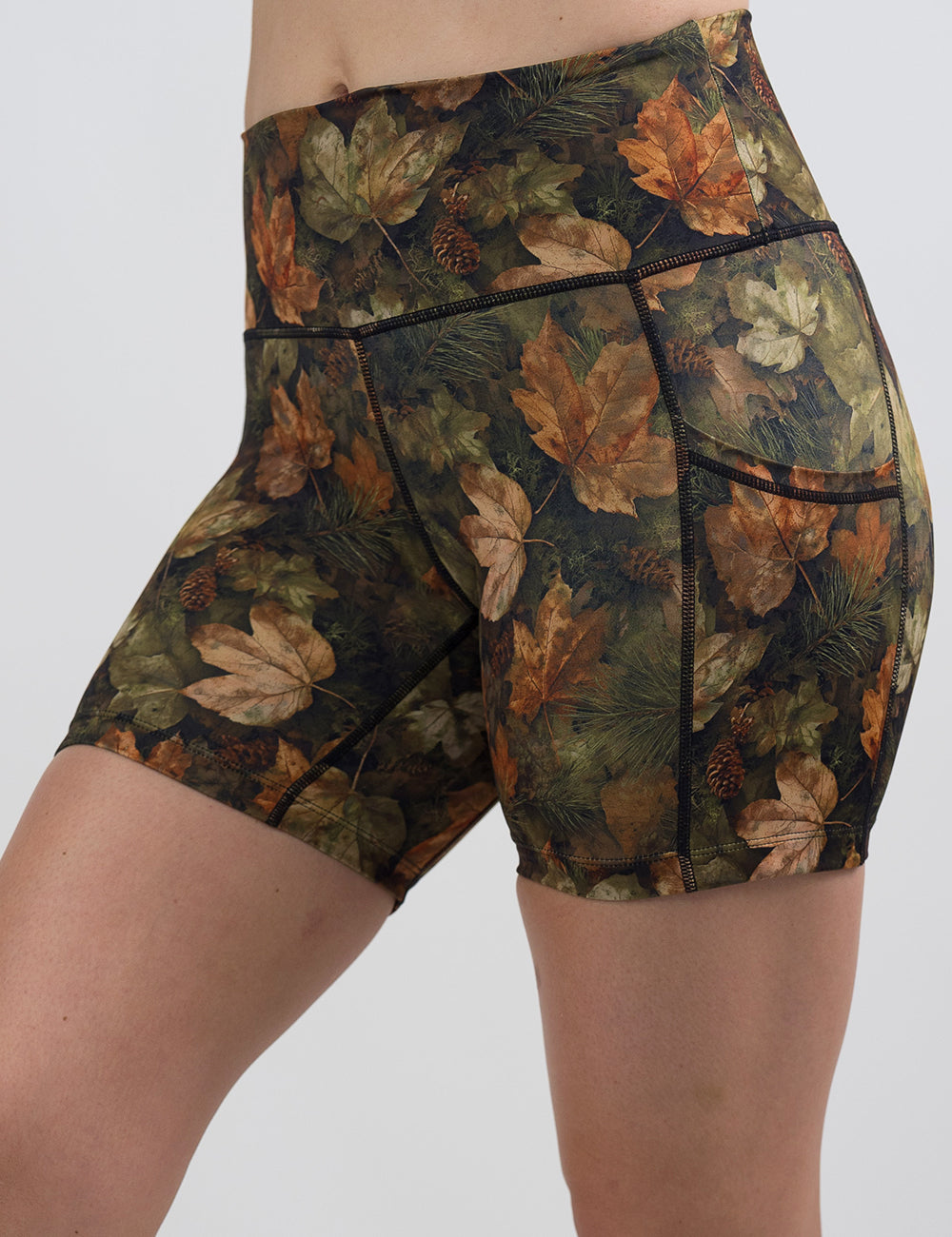 front of the 5 inch forest floor covered in leaves shorts against a white background