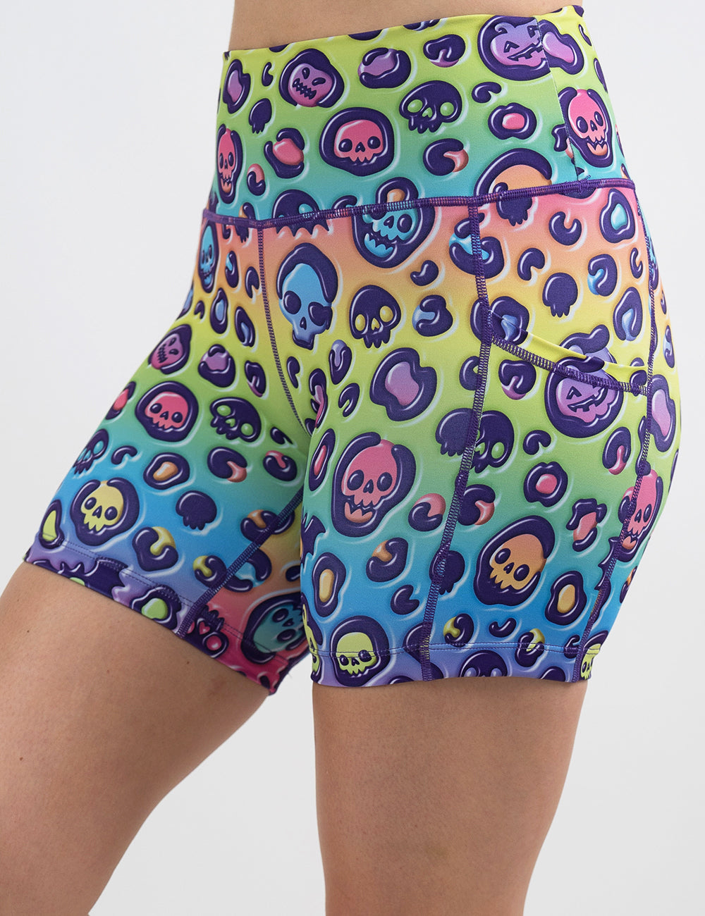 front of the 5 inch rainbow leopard print pumpkins and skulls shorts against a white background