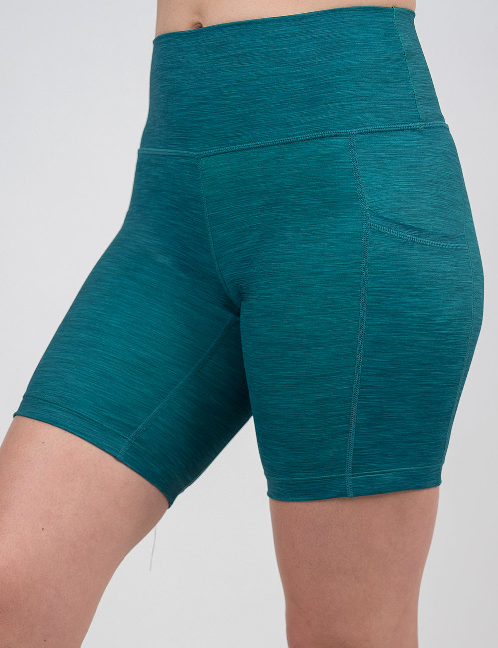 front of the 7 inch teal heather pattern shorts against a white background