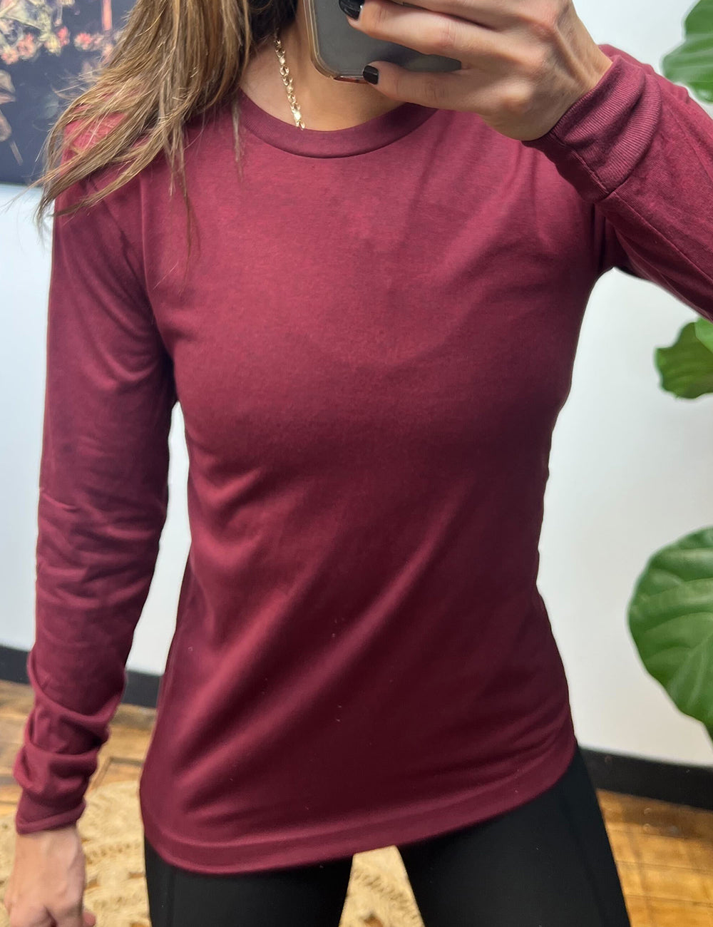 model wearing cardinal long sleeve shirt
