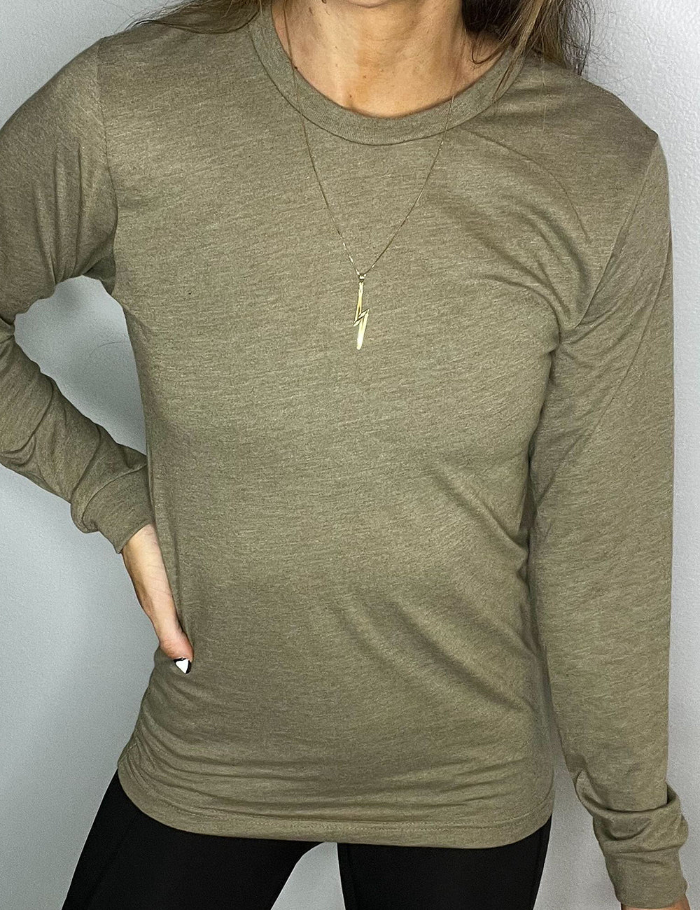 model wearing heather olive long sleeve shirt