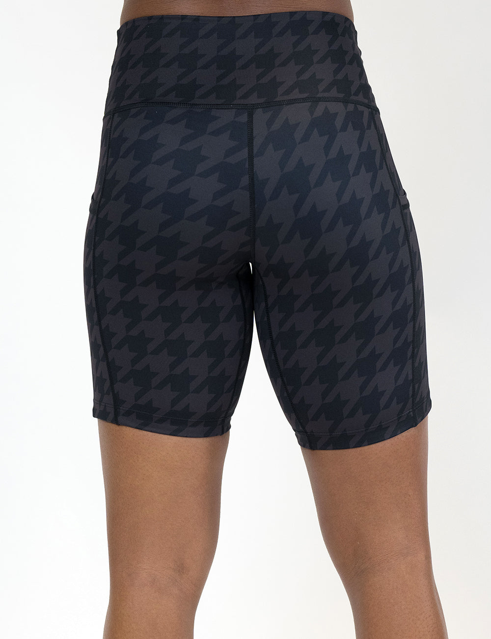back of the 7 inch dark houndstooth pattern shorts against a white background