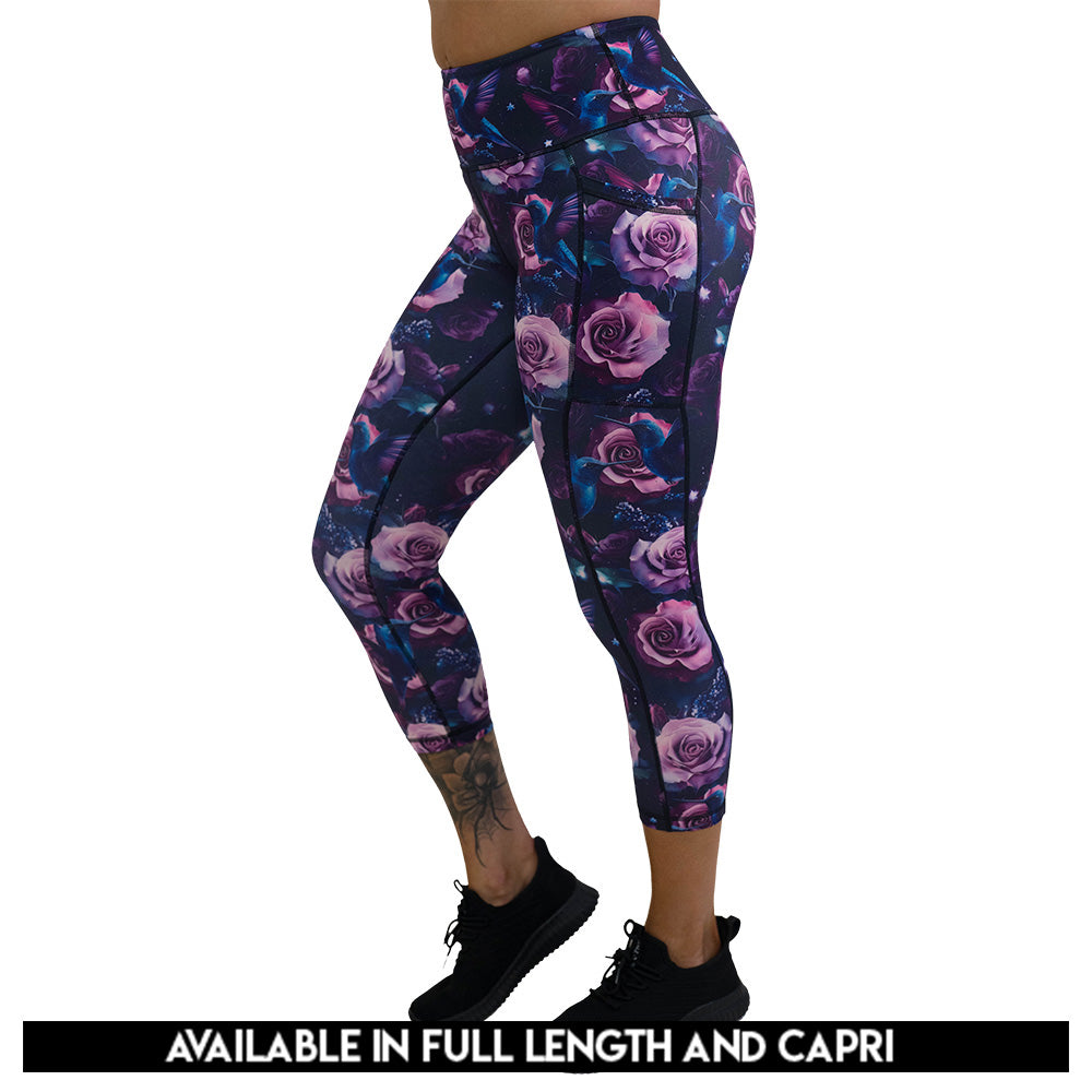 leggings with a design of a blue hummingbird and pink roses available in full and capri length