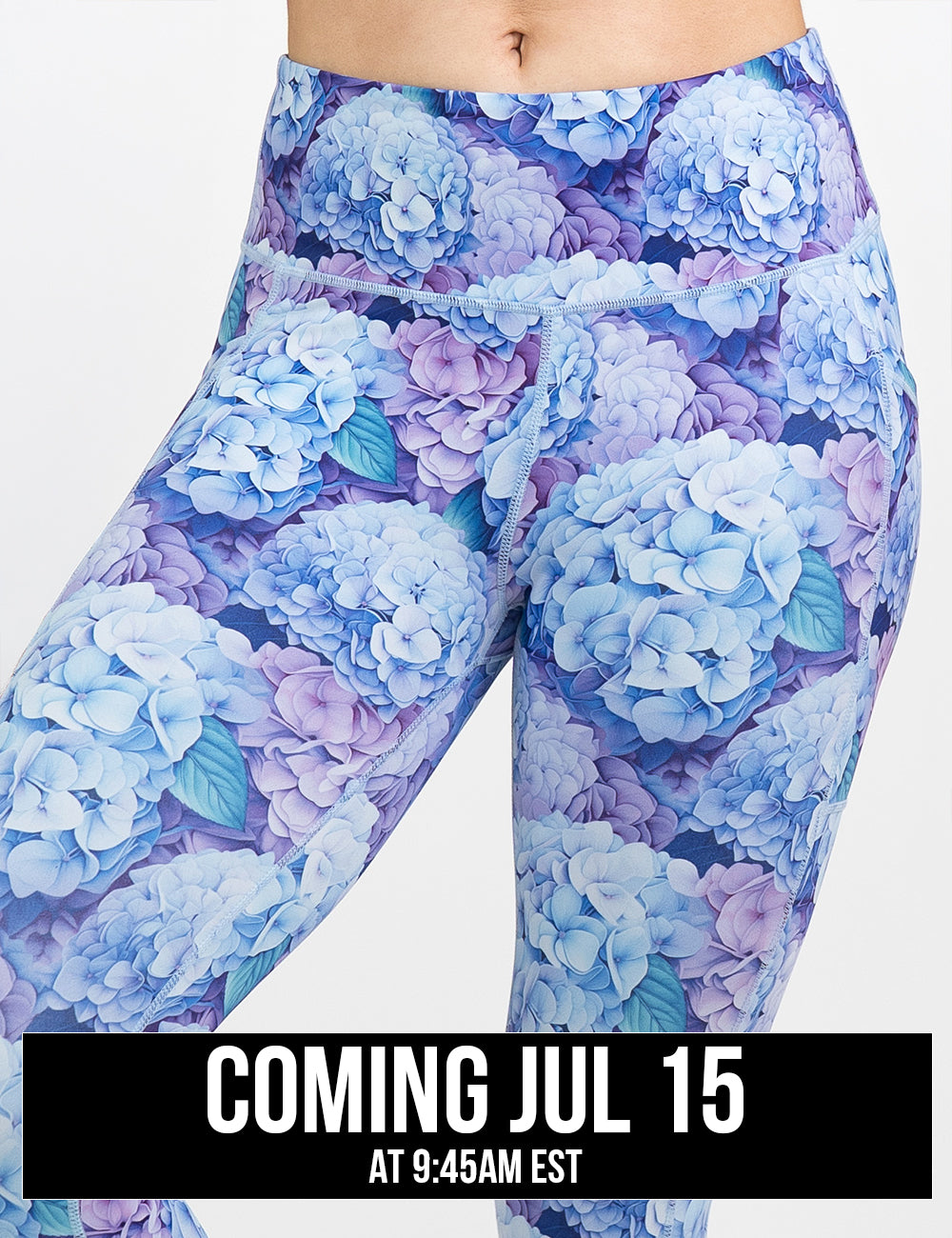 front of the pastel blue and purple hydrangea flower pattern leggings against a white background, coming july 15th