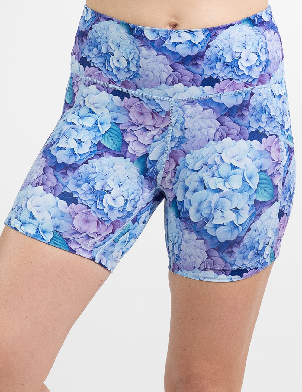 front of the 5 inch blue and purple pastel flowers shorts against a white background