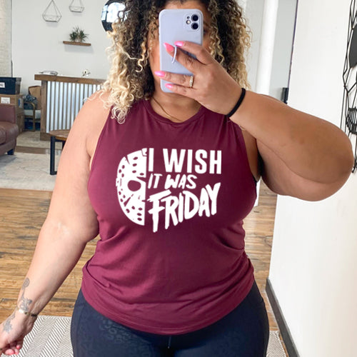 model wearing a maroon colored tank top that has a quote saying "I Wish It Was Friday" in white