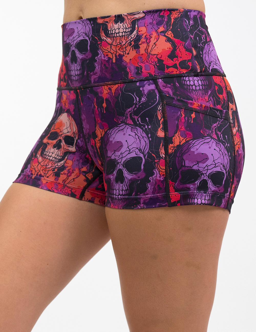 purple and orange skull patterned shorts