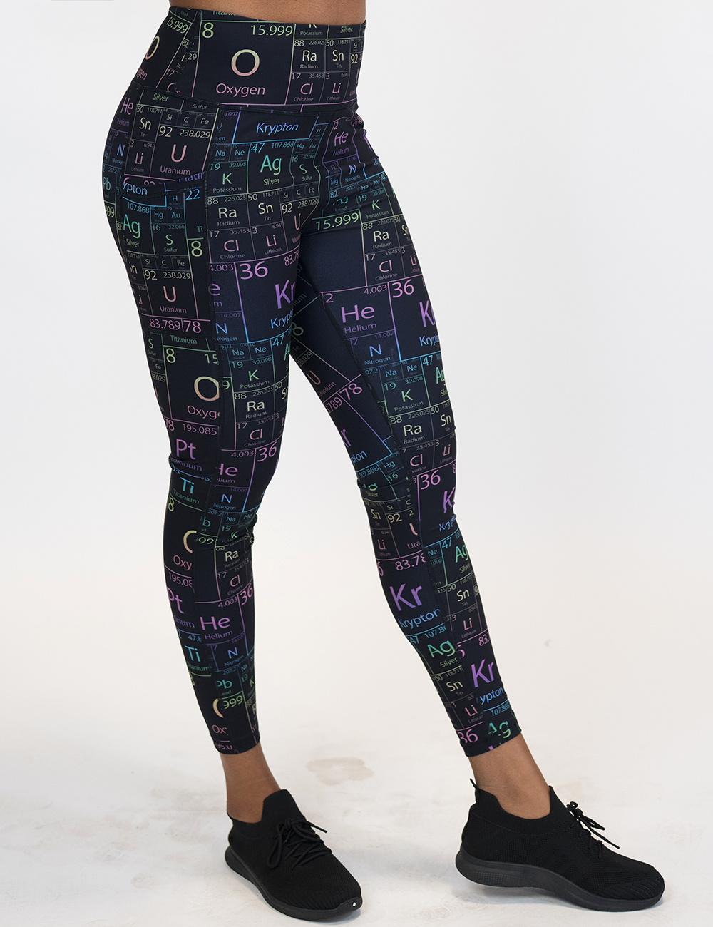 model wearing the full length periodic table leggings against a white background