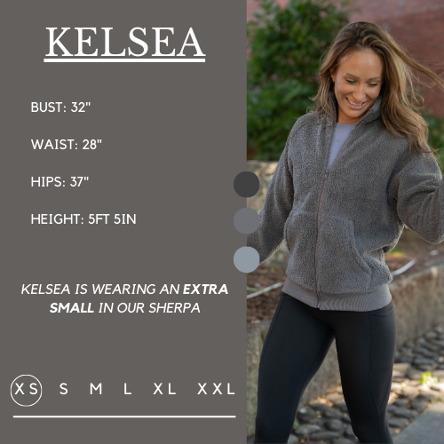 Model's measurements of 32 inch bust, 28 inch waist, 37 inch hips, and height of 5 foot 5 inches. She is wearing a size extra small in the sherpa